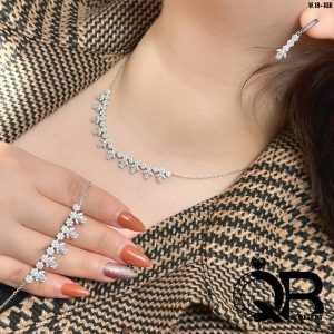 سرویس نقره 925 رادیوم شده با طراحی گل و نگین‌های اتمی درخشان